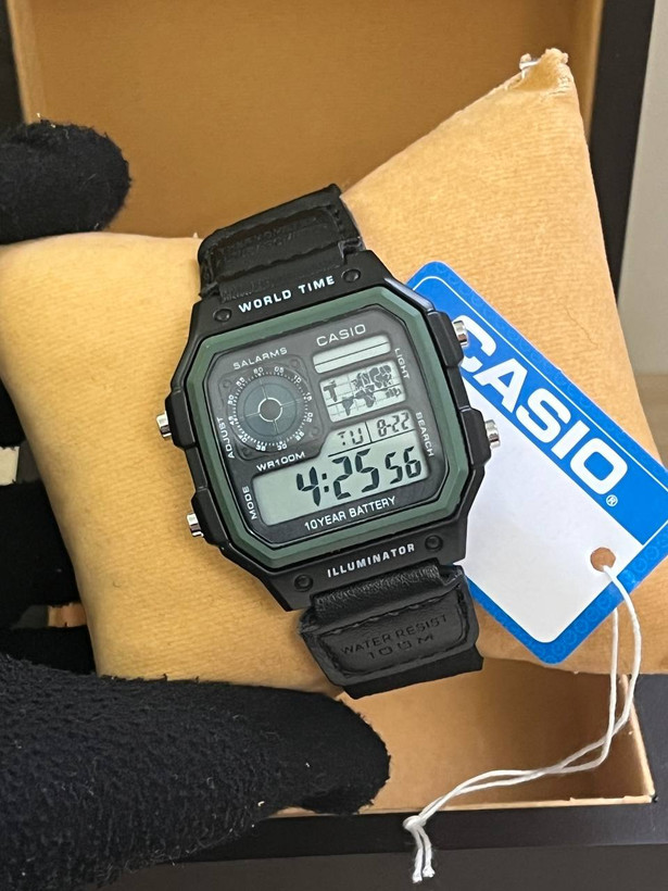 ساعت مردانه دیجیتالی کاسیو Casio جهان نما - بند برزنتی